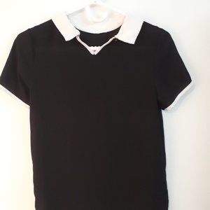 Blouse noir avec col blanc